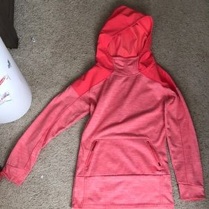 Peach colored north face long sleeve shirt